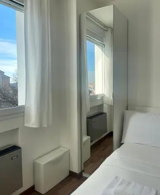 Letto o letti in una camera di 999-Ting