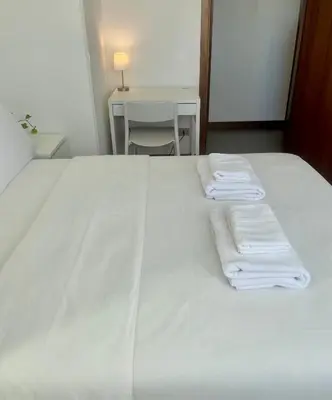 Letto o letti in una camera di 999-Ting