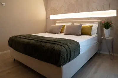 Letto o letti in una camera di Residenza Galileo -affittacamere Padova sud