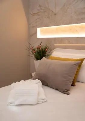 Letto o letti in una camera di Residenza Galileo -affittacamere Padova sud