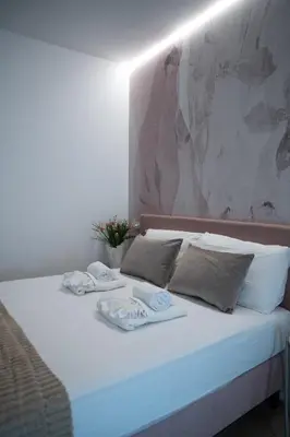 Letto o letti in una camera di Residenza Galileo -affittacamere Padova sud