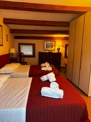 Letto o letti in una camera di Corte Formenta