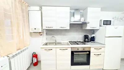 Cucina o angolo cottura di Sweet Apartment by Ca-Sa Check
