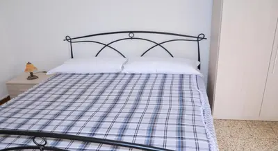 Letto o letti in una camera di B&B Giada