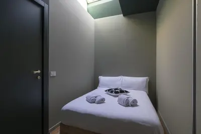 Letto o letti in una camera di Casa Anita sui tetti