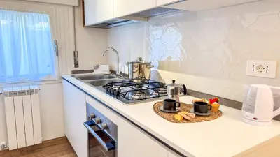 Cucina o angolo cottura di Bon Bon Suite by Ca-sa Check