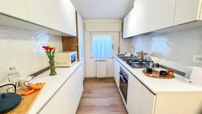 Cucina o angolo cottura di Bon Bon Suite by Ca-sa Check