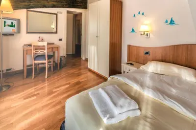 Letto o letti in una camera di Agriturismo B&B Il Girasole