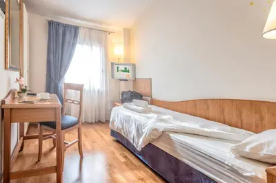 Letto o letti in una camera di Agriturismo B&B Il Girasole