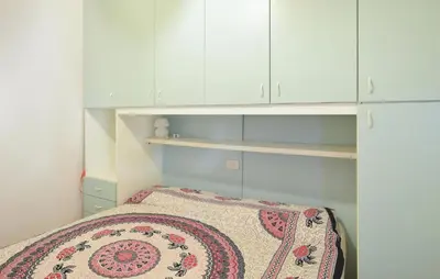 Letto o letti in una camera di Paola 5