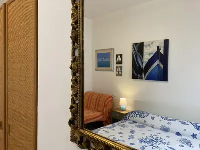 Letto o letti in una camera di Modern flat just 150 mt from the sea
