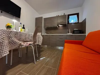 Cucina o angolo cottura di Cozy apartment in the heart of the pinewood