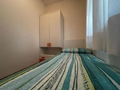 Letto o letti in una camera di Cozy apartment in the heart of the pinewood