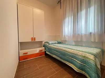 Letto o letti in una camera di Cozy apartment in the heart of the pinewood