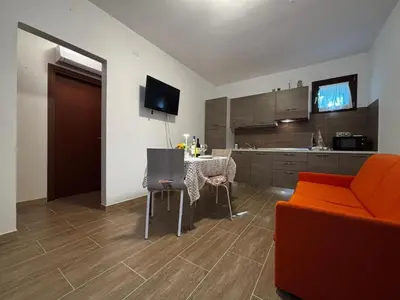 Cucina o angolo cottura di Cozy apartment in the heart of the pinewood