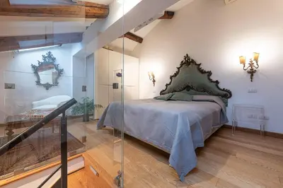 Letto o letti in una camera di San Polo Charming House
