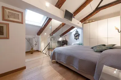 Letto o letti in una camera di San Polo Charming House
