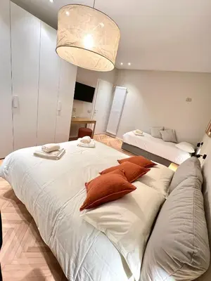 Letto o letti in una camera di Residenza Lungosile