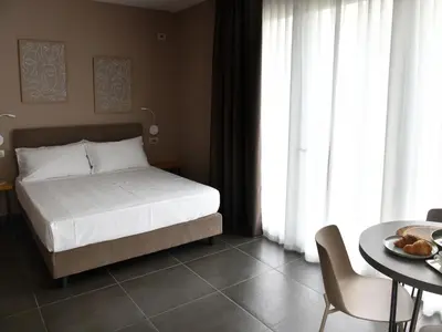 Letto o letti in una camera di Domus Natura