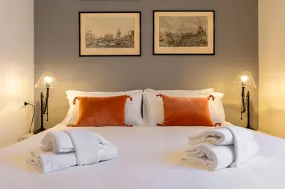 Letto o letti in una camera di Dero' Home