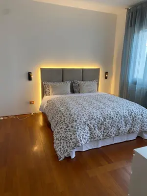 Letto o letti in una camera di Attic Mestre Station no lift