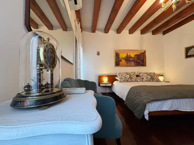 Letto o letti in una camera di Ca' Dolce Rosa