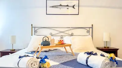 Letto o letti in una camera di Mar Suite by Ca-Sa Check
