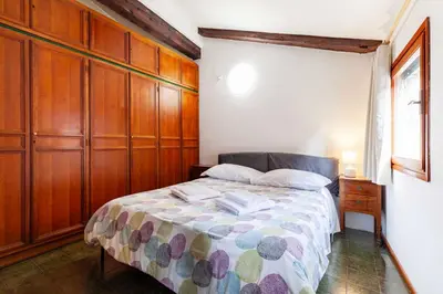 Letto o letti in una camera di Attico Blenner