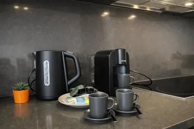 Set per la preparazione di tè e caffè presso Riccati Loft, Historic Center Apartment, 2BR 2BA Lift