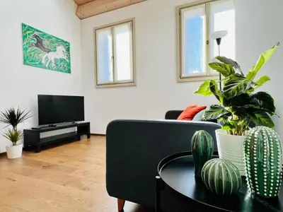 Area soggiorno di Riccati Loft, Historic Center Apartment, 2BR 2BA Lift