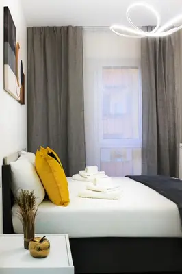 Letto o letti in una camera di Golden Nest Padova