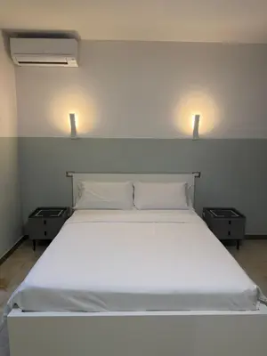 Letto o letti in una camera di HHBB hotel