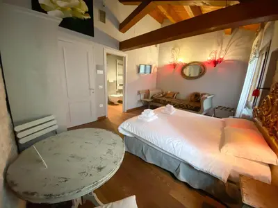 Letto o letti in una camera di Rosso Charm B&B