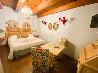 Letto o letti in una camera di Rosso Charm B&B
