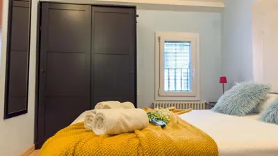 Letto o letti in una camera di La Casa Gialla by Ca-Sa Check