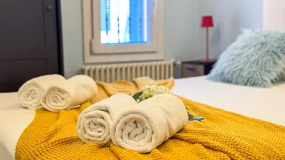 Letto o letti in una camera di La Casa Gialla by Ca-Sa Check