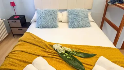 Letto o letti in una camera di La Casa Gialla by Ca-Sa Check