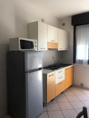 Cucina o angolo cottura di Bright flat in Rosolina with shared pool