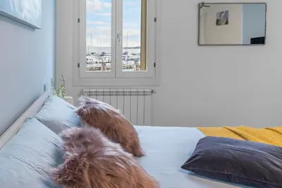Letto o letti in una camera di Casa Gabbiano by Ca-sa Check