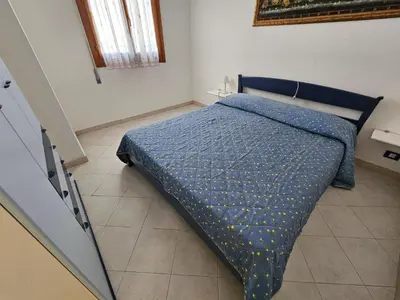 Letto o letti in una camera di Pleasant apartment in Rosolina Mare with balcony