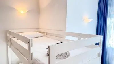 Letto o letti in una camera di Liam Leo Suite by Ca-Sa Check