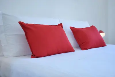 Letto o letti in una camera di Welc-ōM Santo Padova