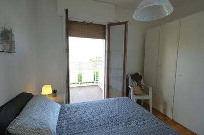Letto o letti in una camera di Trilocale Diplomatic Fronte Mare Piazza Torino