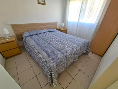 Letto o letti in una camera di Apartment in Rosolina Mare near beach