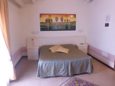 Letto o letti in una camera di Sweet Home