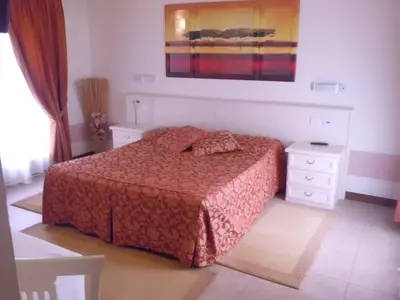 Letto o letti in una camera di Sweet Home