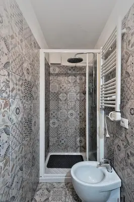 Bagno di Treviso Centro, Mansarda design con travi a vista