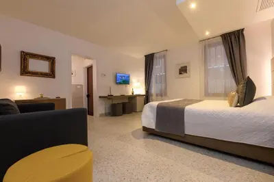 Letto o letti in una camera di Sweet Apartment