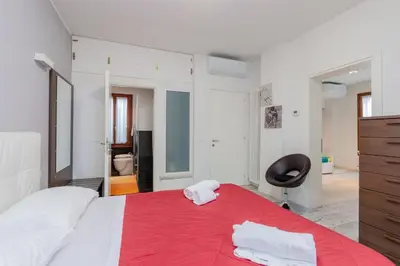 Letto o letti in una camera di GuestHost - Giovanni's Home with balcony