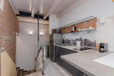 Cucina o angolo cottura di GuestHost - Giovanni's Home with balcony